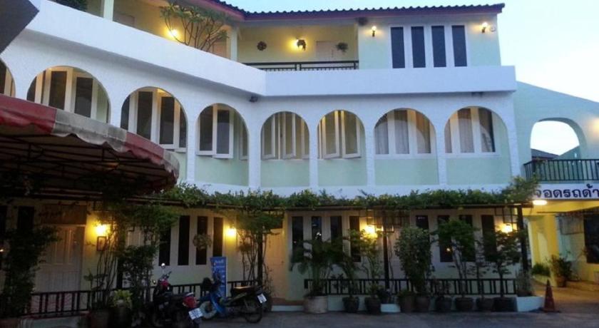 a large white building with a large window, Casa Holiday Hotel (SHA Certified) in Phitsanulok