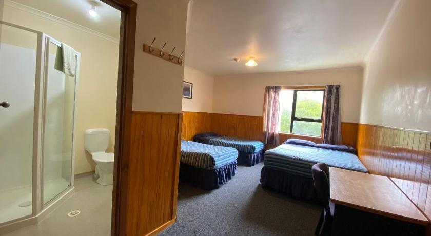 Image of Triple Room with Private Bathroom 0