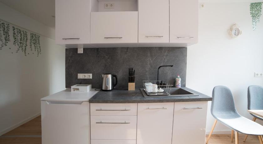 Schöne Ferienwohnung 54 m² Zentrumsnah Kingbett - image 32