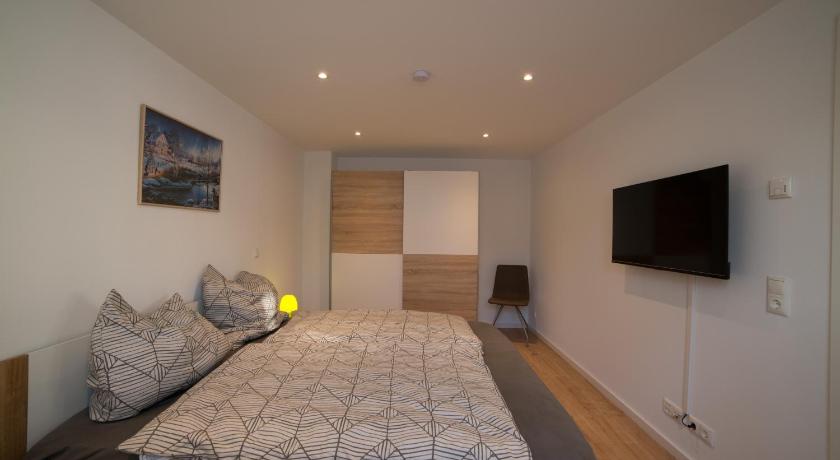 Schöne Ferienwohnung 54 m² Zentrumsnah Kingbett - image 26