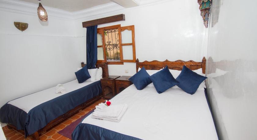Image of Triple Room with Private Bathroom 5