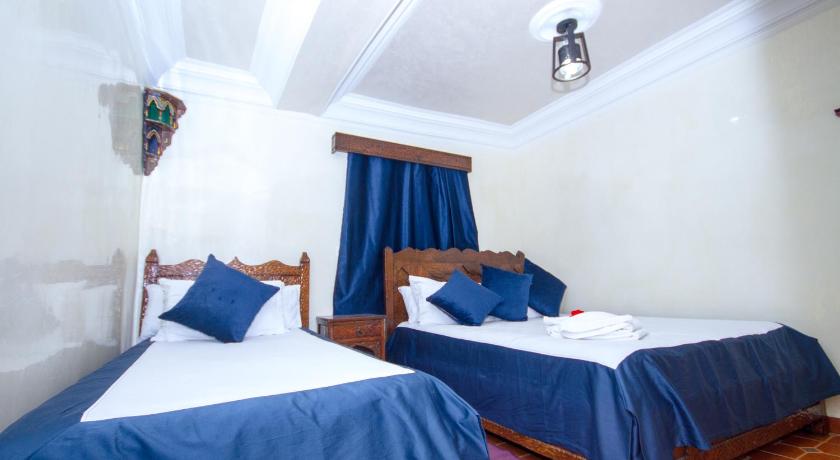 Image of Triple Room with Private Bathroom 8