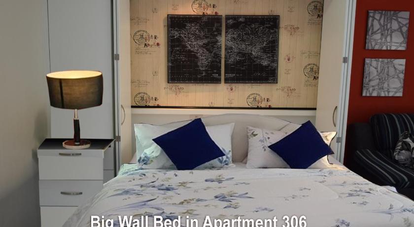 Image of Deluxe One-Bedroom Suite with Pool and Sea View - 306 14