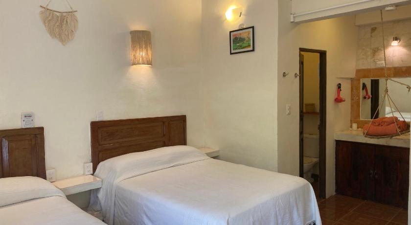 Image of Double Room with Two Double Beds and Garden View 0