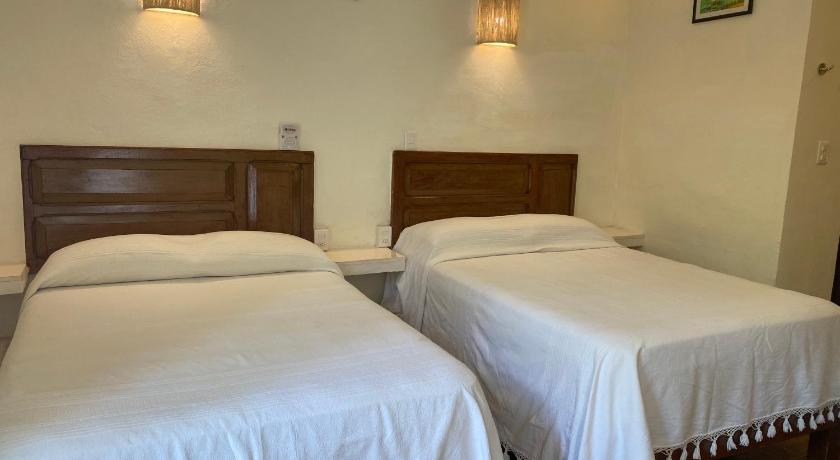 Image of Double Room with Two Double Beds and Garden View 8