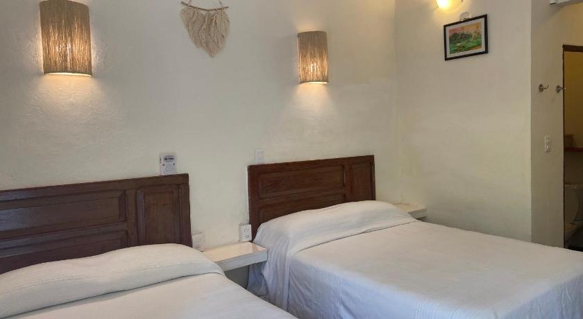 Image of Double Room with Two Double Beds and Garden View 4