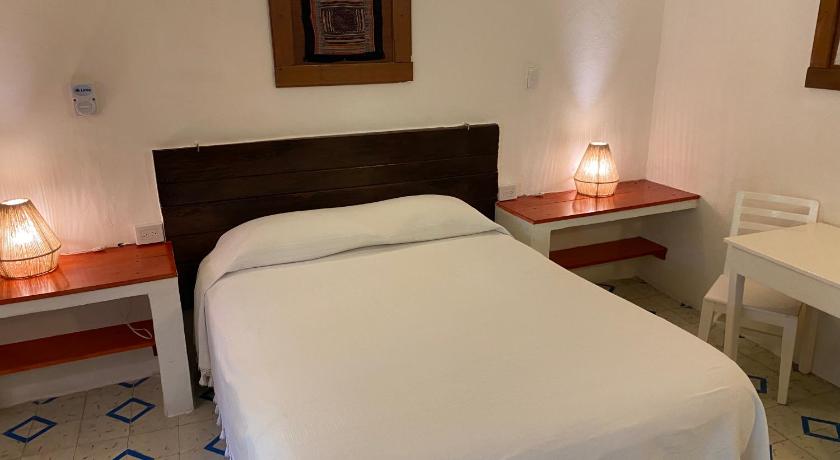 Image of Queen Room with Patio View 13