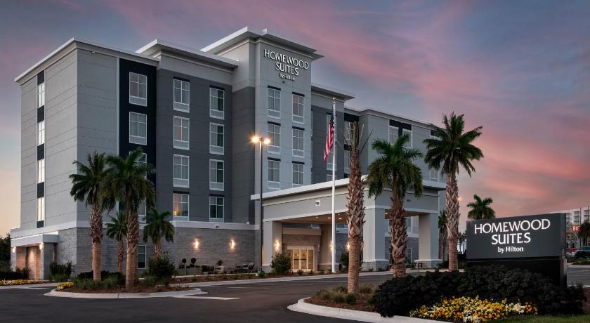 a large building with a large clock on the front of it, Homewood Suites by Hilton Destin in Destin (FL)