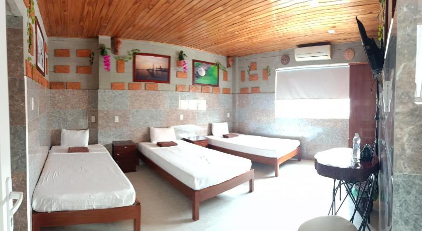 Image of Deluxe Triple Room 6
