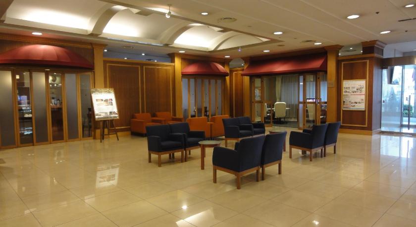 a large room with a lot of chairs and tables, Mito Keisei Hotel in Mito