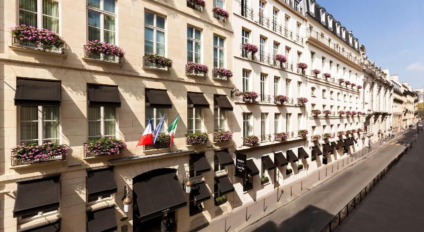 a row of windows on the side of a building, Castille Paris – Starhotels Collezione in Paris