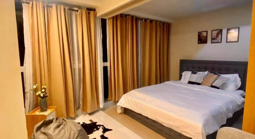 Uptown Parksuites — Hotel in Manila