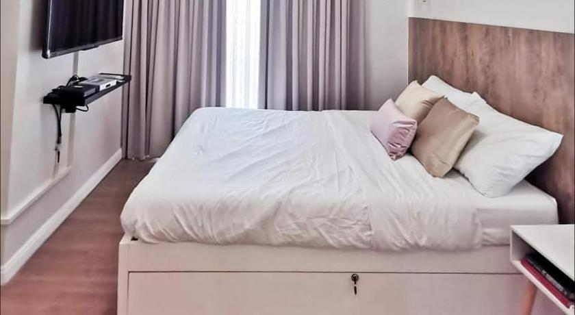 SHERISSE' CONDO @ THE LOOP WITH WIFI,CABLE AND HOT & COLD SHOWER, photo