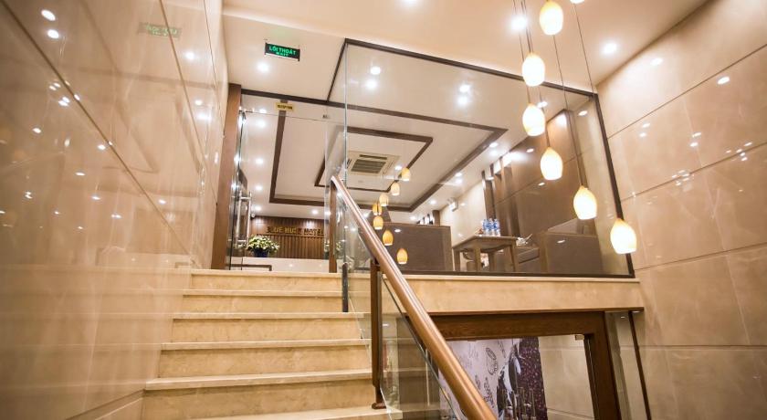 a staircase leading up to a stair case, Hotel Blue Rose in Haiphong