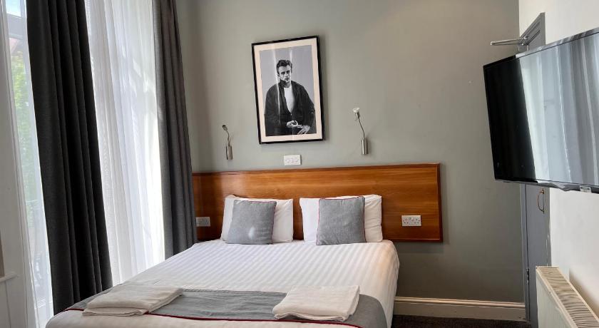 Immagine di Camera Quadrupla Deluxe (Deluxe Quad Room) 9