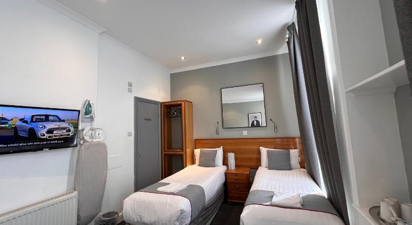 Immagine di Camera Quadrupla Deluxe (Deluxe Quad Room) 6