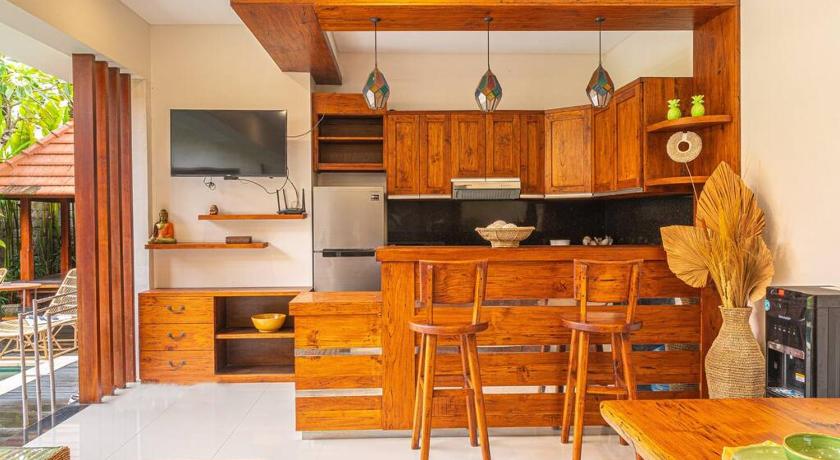 Cozy 2-bed villa with pool 5 mins to finns beach photo