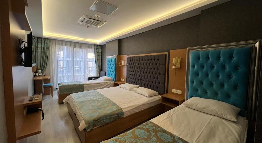 Image of Deluxe Quadruple Room 11