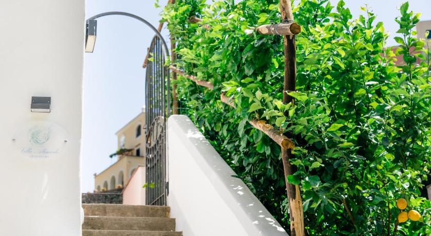 a row of stairs leading up to a balcony, Villa Alimede in Positano