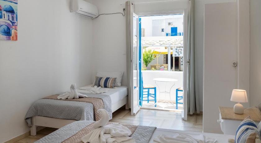 รูปของห้องพักสำหรับ 3 คน พร้อมเครื่องปรับอากาศ (Triple Room with Air Conditioning) 7