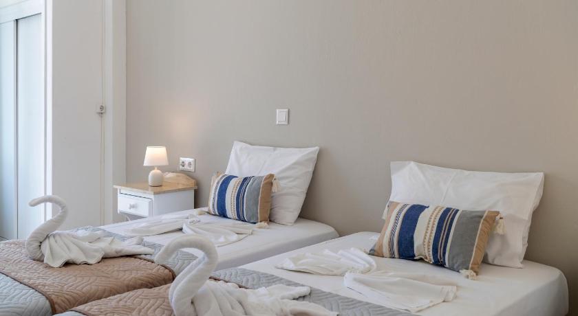 รูปของห้องพักสำหรับ 3 คน พร้อมเครื่องปรับอากาศ (Triple Room with Air Conditioning) 6