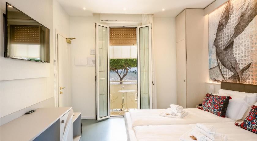 a hotel room with a view of the ocean, Hotel Le Lampare in Caorle