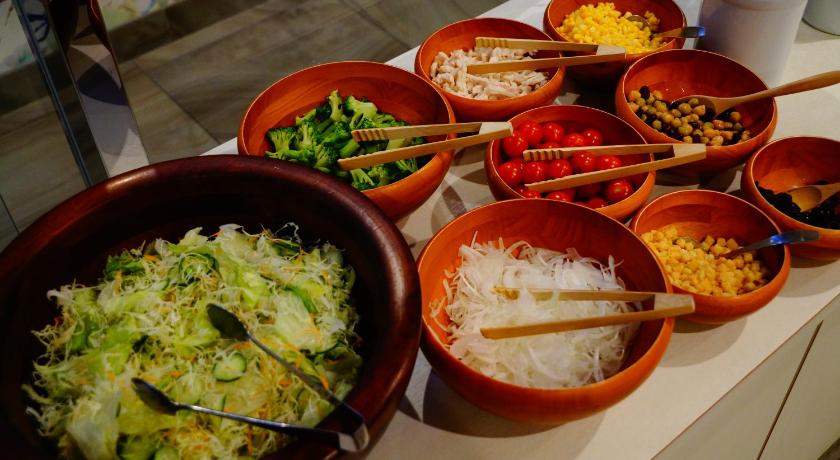 a table topped with bowls of different types of food, Sarasa Hotel Shinsaibashi in Osaka