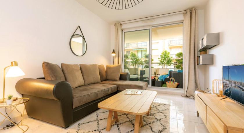 a living room filled with furniture and a window, Beautiful Apt With Terrace Near Velodrome in Marseille
