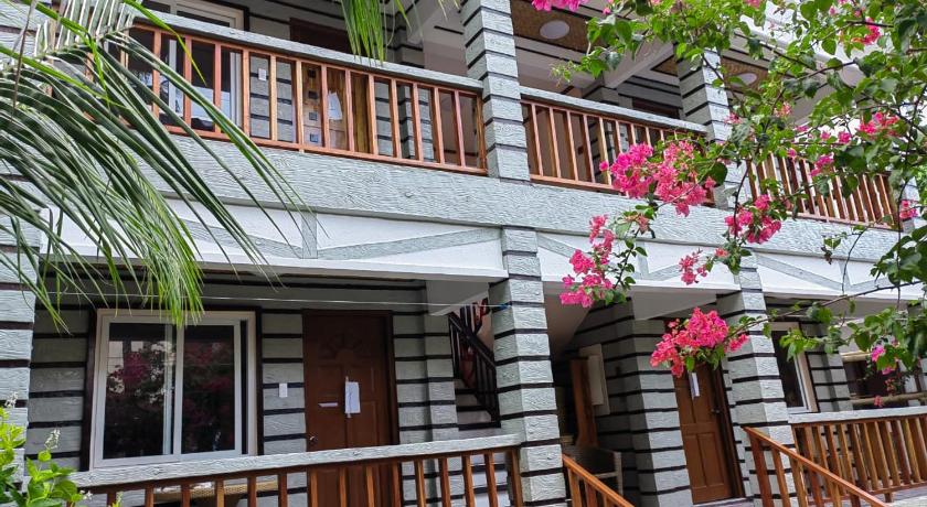 a house with a balcony and a large window, Nigi Nigi Too Beach Resort in Boracay Island