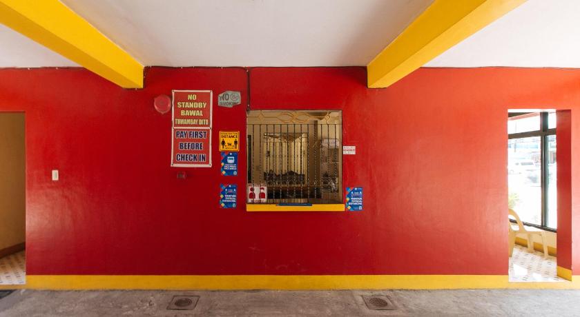 a red wall in a room with a red wall, RedDoorz @ Golden Victory Hotel Mabalacat Pampanga in Mabalacat