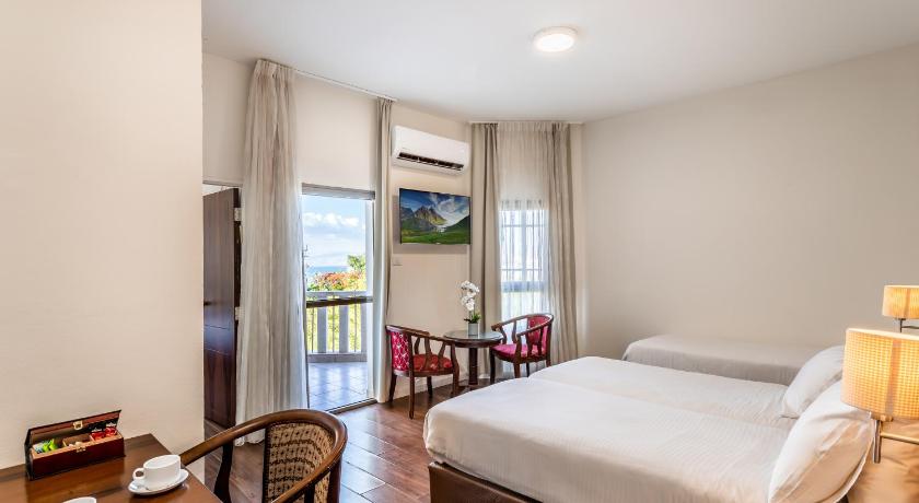 Image of Standard Triple Room with Balcony 7