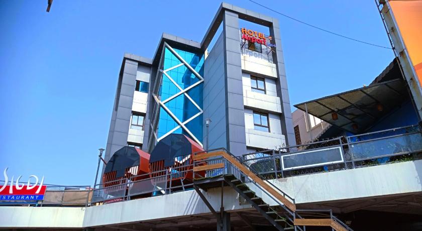 Capital O 41587 Hotel Airport Inn One photo