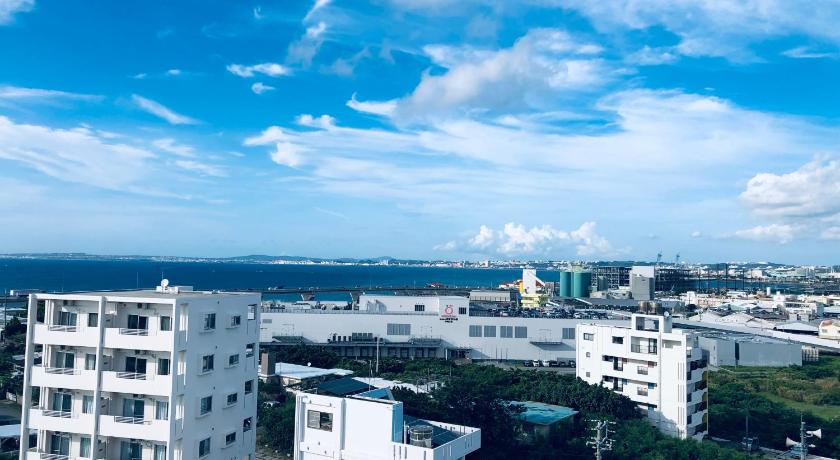 a large building with a lot of windows, HOTEL COZY STAY IN Minatogawa in Okinawa Main island