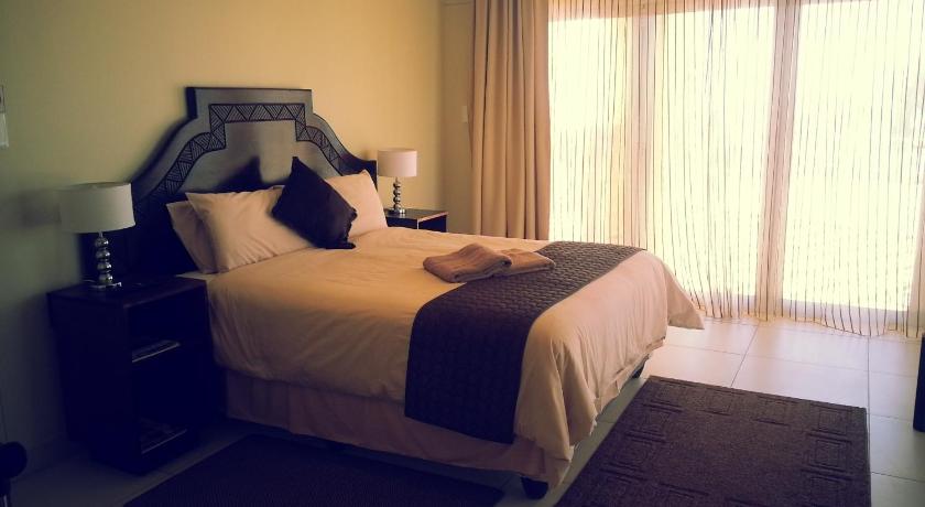 Image of Double Room with Patio and Sea View 0