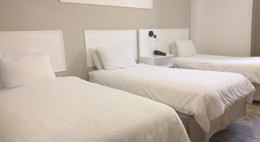Фото: Трехместный номер (Triple Room) 4