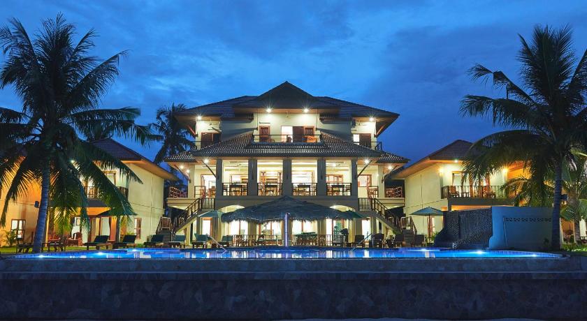a large house with a large clock on the front of it, Sara Beachfront Boutique Resort in Chumphon