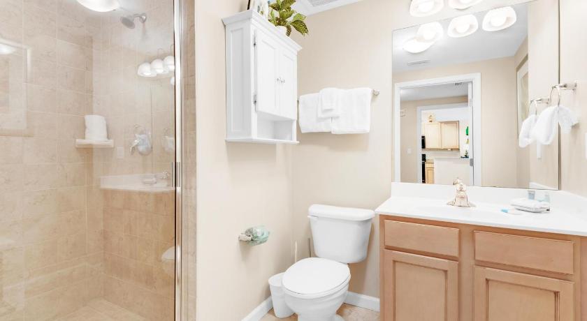 a bathroom with a toilet, sink, and shower, Palms Resort #2212 Jr. 2BR by RealJoy Vacations in Destin (FL)