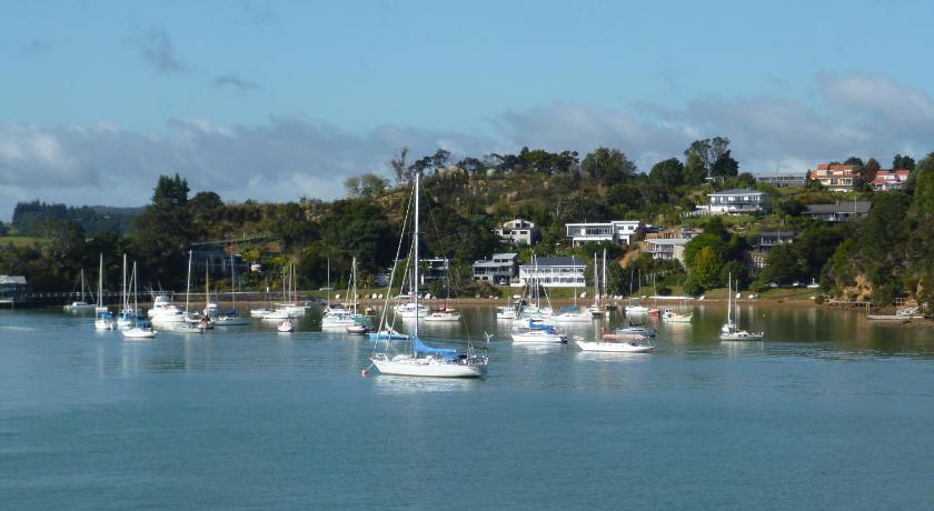 boats are docked in the water, Opua Boutique Seaview Motel in Bay of Islands