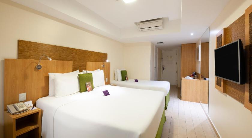Image of Standard Room with One Double Bed and One Single Bed 0