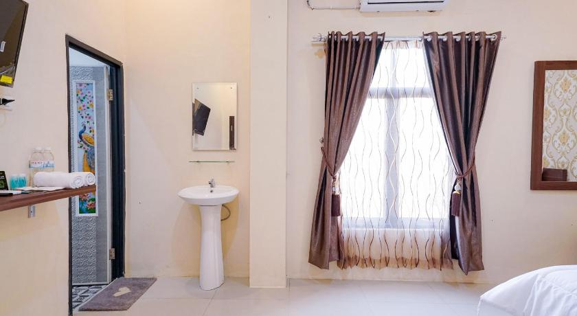 Urbanview Hotel St Faustina Lampung photo