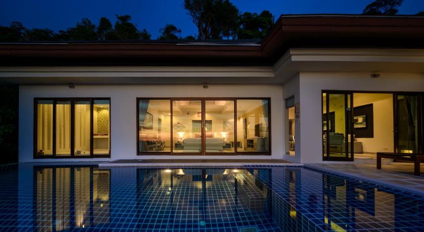 a large swimming pool in a hotel room, Andamantra Resort and Villa Phuket (SHA Extra plus) in Phuket