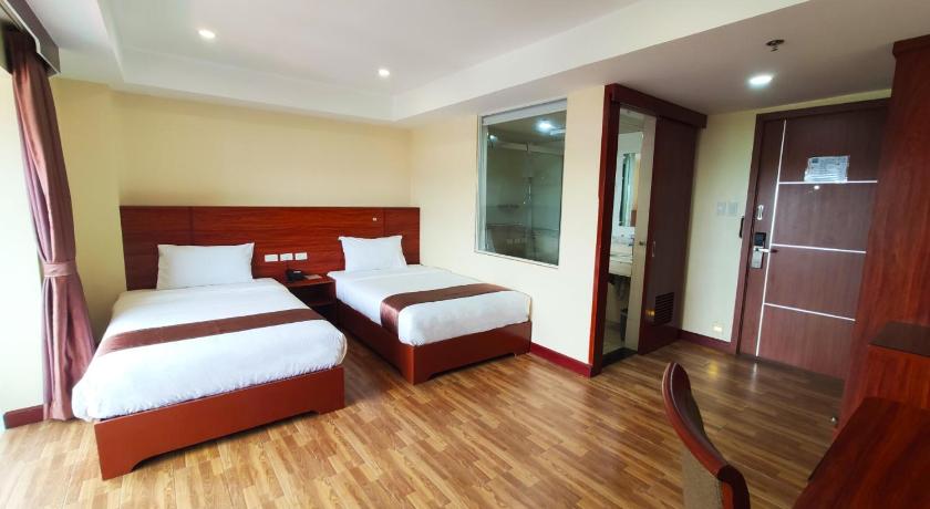 Image of Two Double Beds City View 4