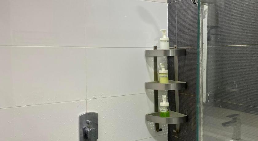 【NETFLIX】Suasana Suites,Nxt to CIQ【PoolGym&WIFI】 photo