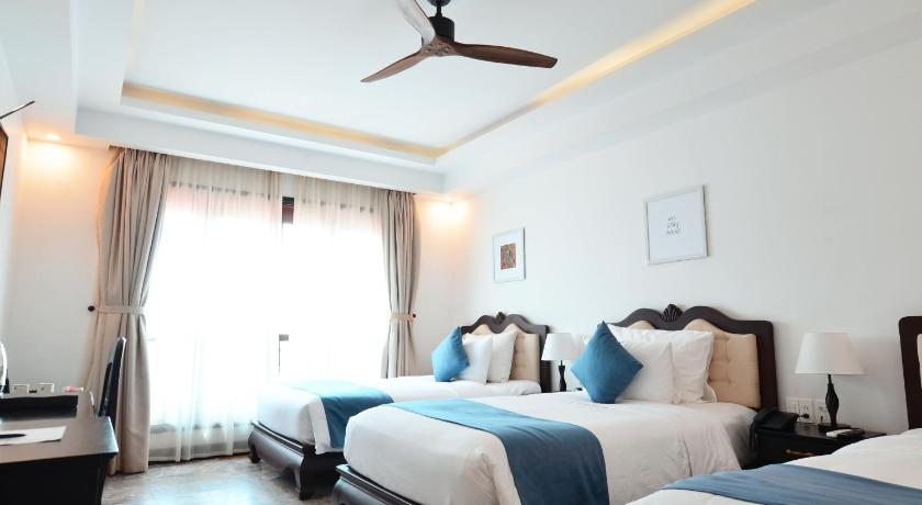 Image of Deluxe Triple Room 0