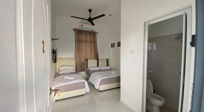 dsinggahPCB Guest House photo