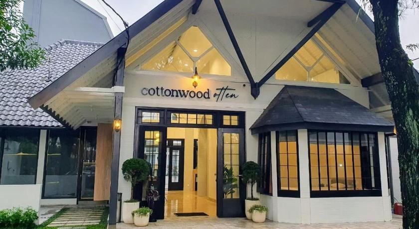 a blue and white building with a large window, Cottonwood Boutique Heritage Otten in Bandung