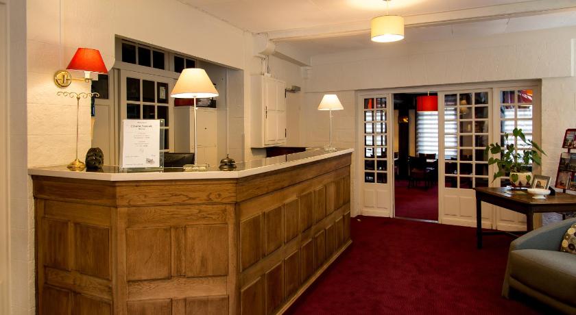 a large kitchen with a large counter top, Hotel de Normandie in Evreux