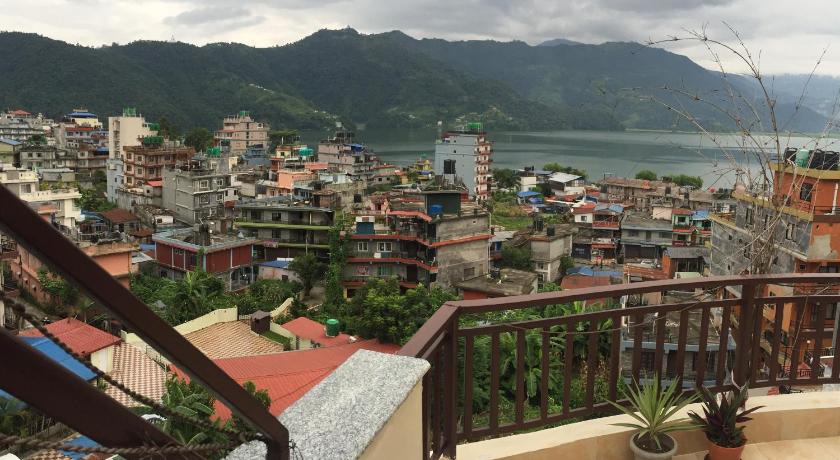 a view from a balcony overlooking a city, Beli Guest House in Pokhara