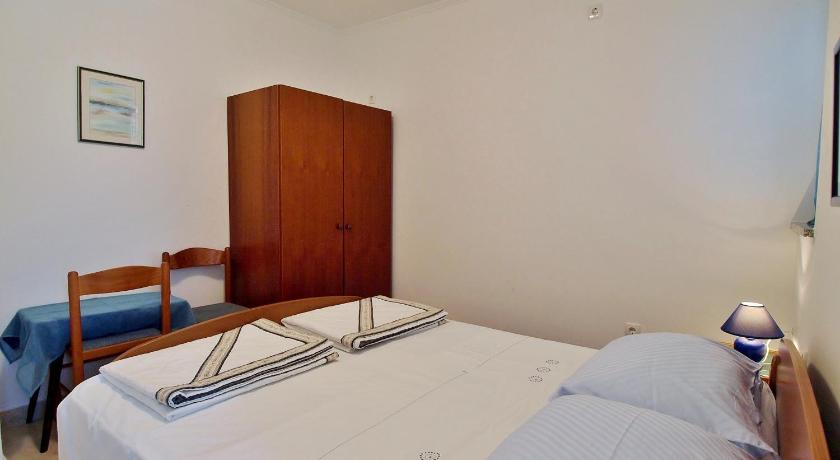 Apartments and rooms by the sea Rab - 12616 photo