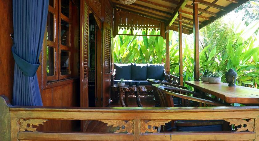 The Hidden Escapes Manggis- Stunning Tiny Home set on a Lake with Mountain View, Private Sauna, Pool photo